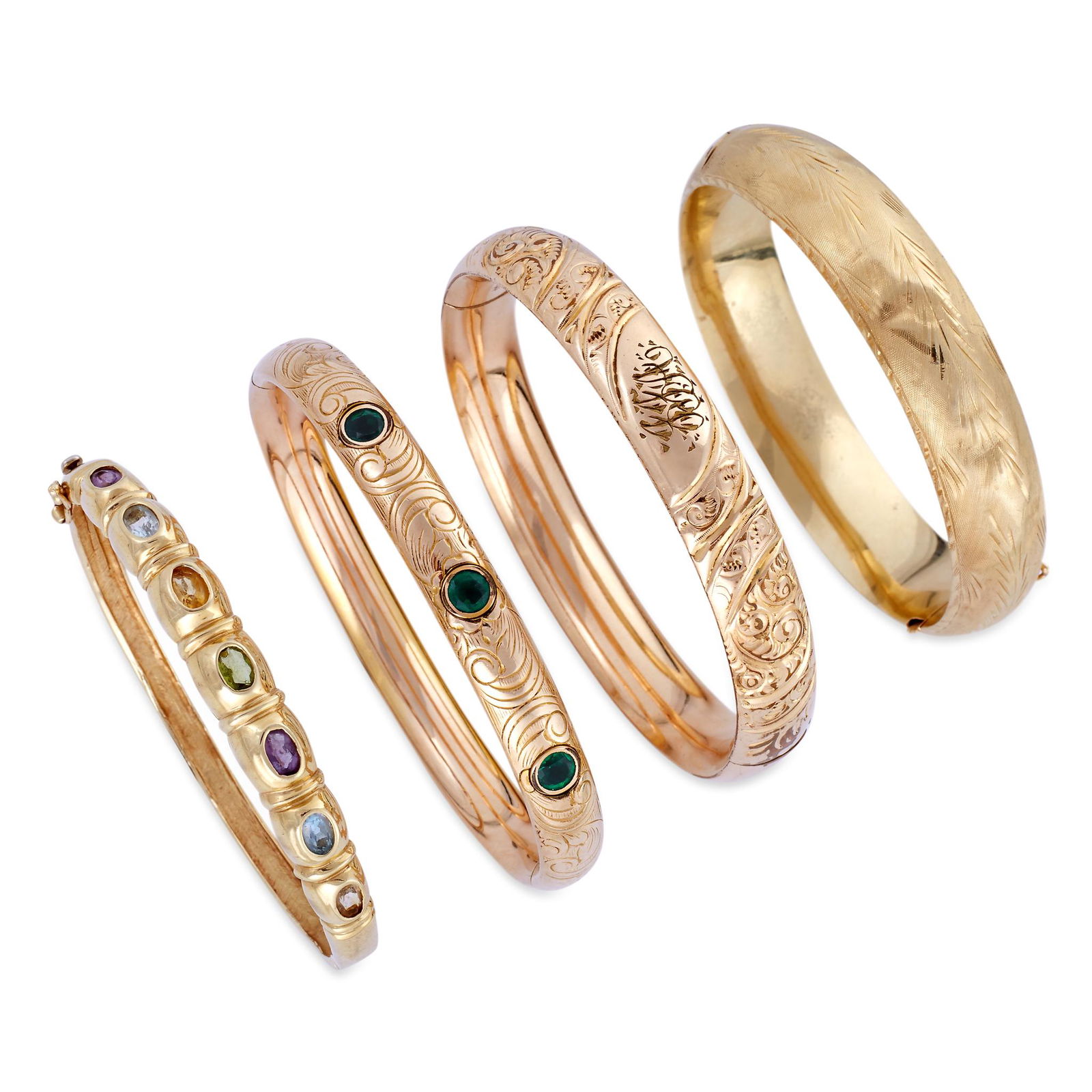 A group of four gold bangles (1 of 1)