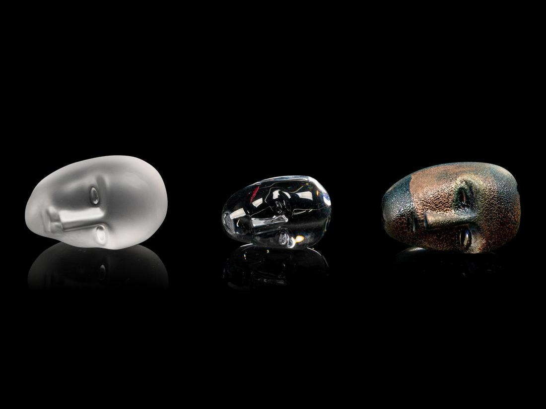 Bertil Vallien (Swedish, b. 1938) Three Head: Bertil Vallien (Swedish, b. 1938) Three Head Paperweights Kosta Boda, Sweden cast glass etched signature to underside Largest 3 inches