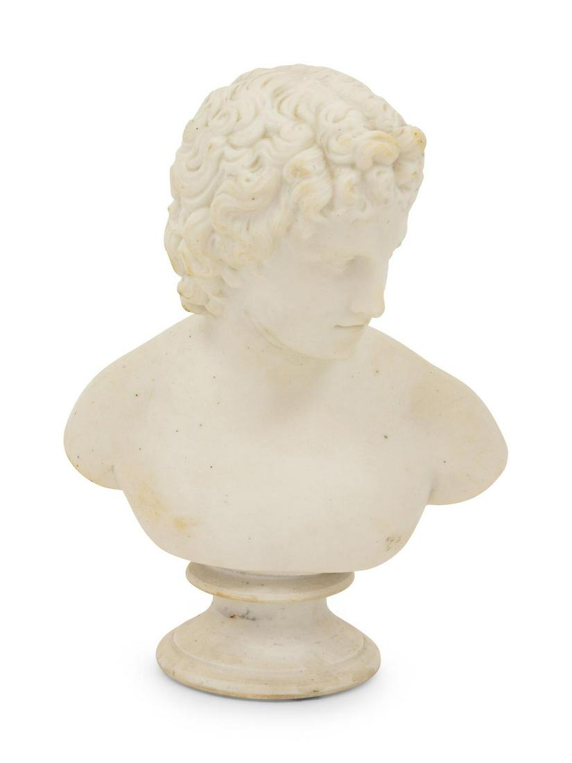 A Neoclassical Parianware Bust of Apollo: A Neoclassical Parianware Bust of Apollo 19th Century Height 8 1/4 inches. Property from the Collection of Michael and Janice Doniger, Chicago, Illinois
