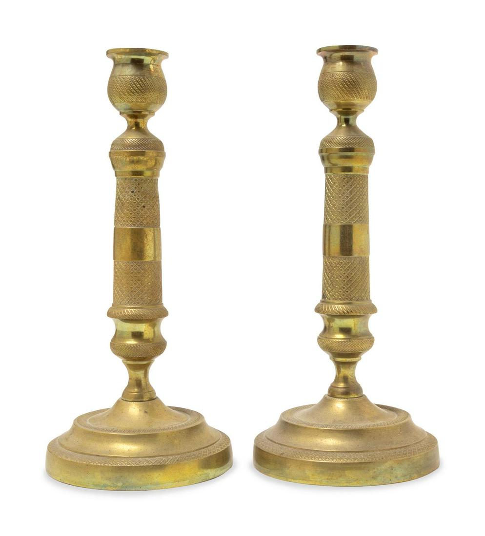 A Pair of Neoclassical Style Brass Candlesticks: A Pair of Neoclassical Style Brass Candlesticks Late 19th/Early 20th Century Height 10 3/8 inches. Property from the Collection of Dr. Gregory Boshart and Dr. William Lawrence, Chicago, Illinois