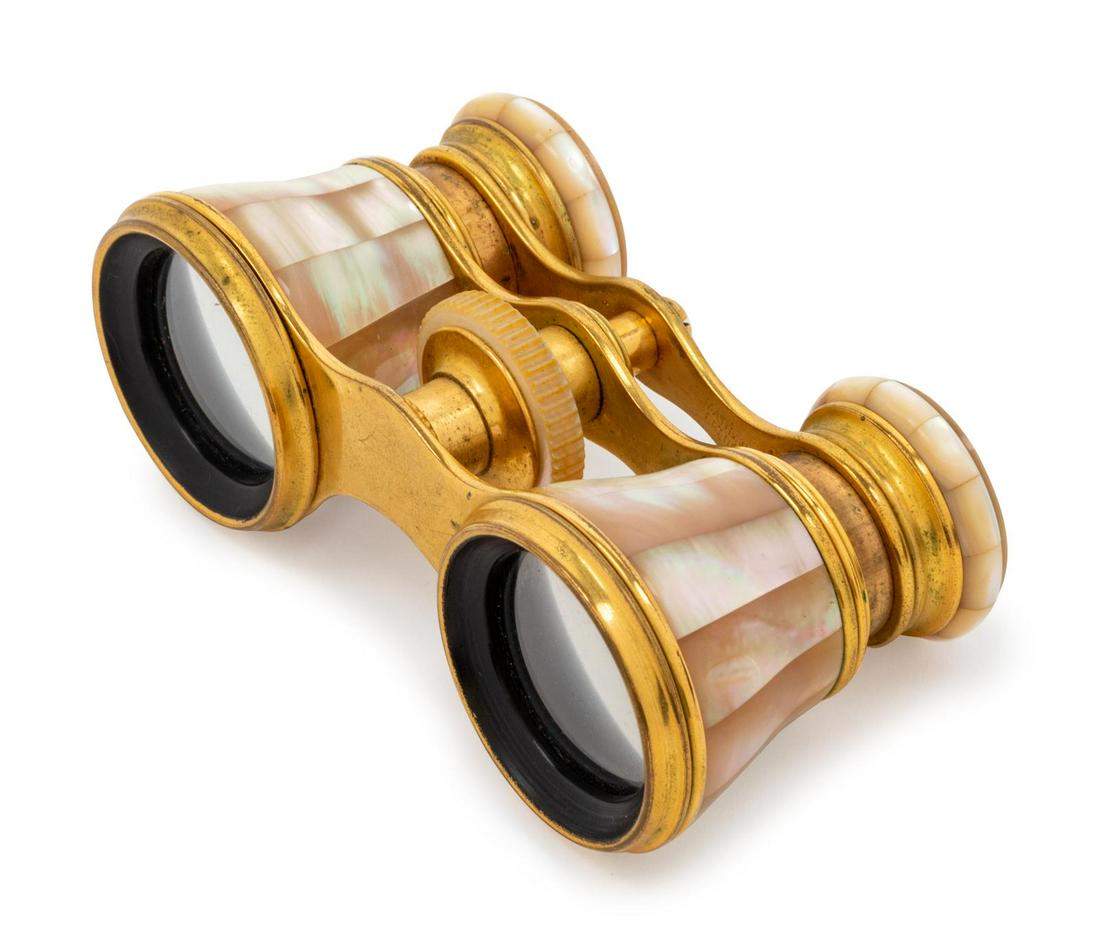 A Pair of French Mother-of-Pearl Veneered Opera Glasses: A Pair of French Mother-of-Pearl Veneered Opera Glasses with case.