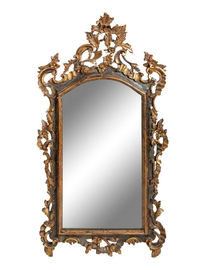 An Italian Baroque Style Giltwood Mirror: An Italian Baroque Style Giltwood Mirror Height 49 x width 26 inches.