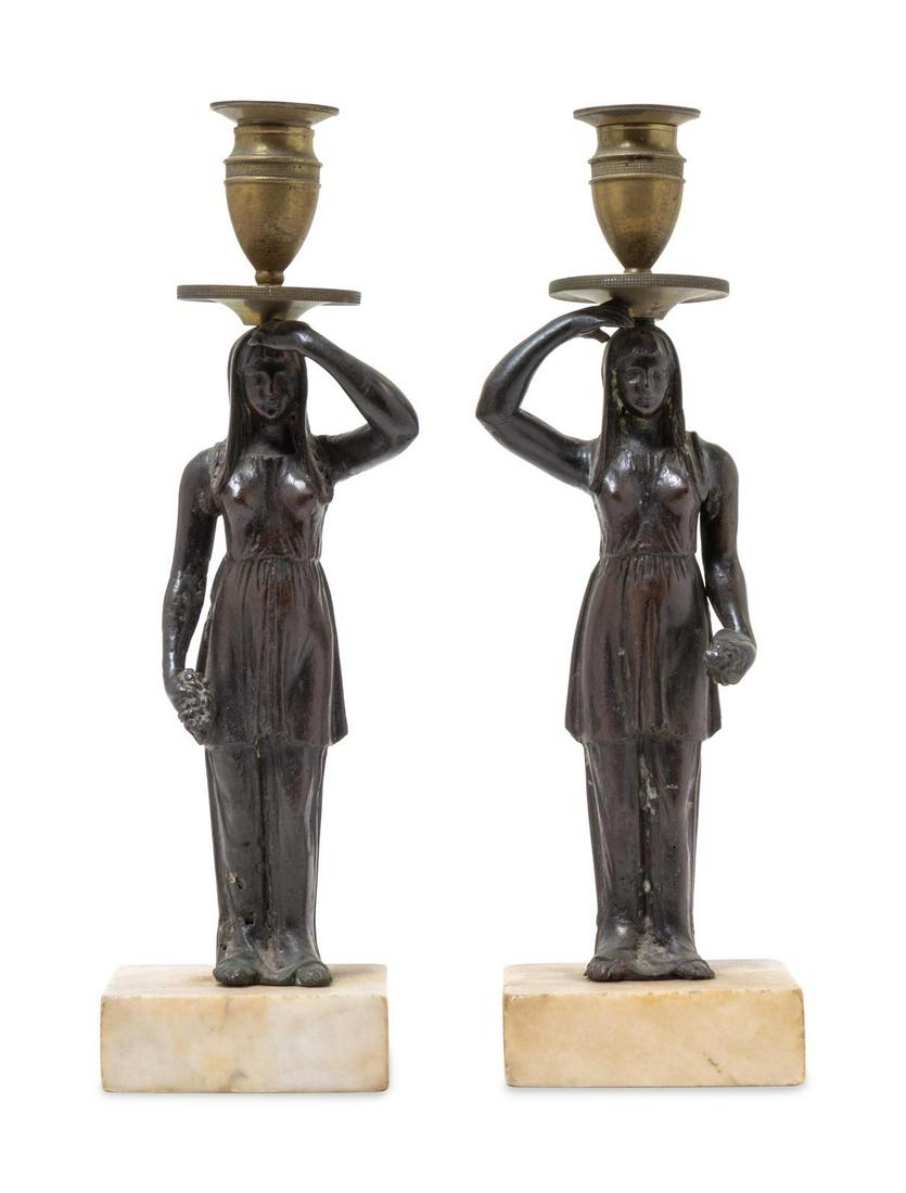 A Pair of Bronze Figural Candlesticks: A Pair of Bronze Figural Candlesticks Late 19th/Early 20th Century Height 11 3/8 inches. Property from the Collection of Dr. Gregory Boshart and Dr. William Lawrence, Chicago, Illinois