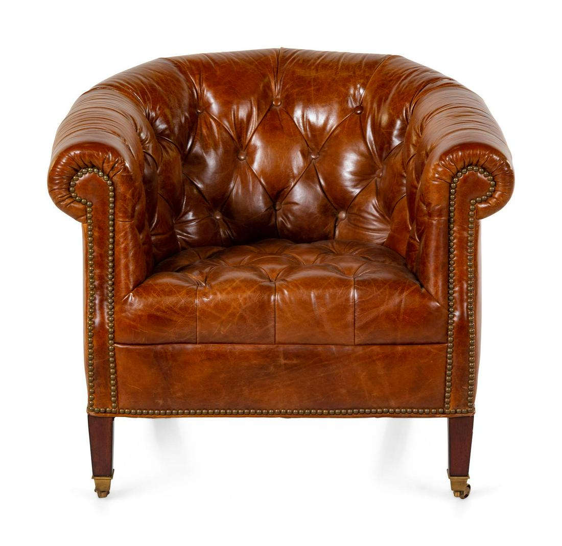 A Tufted Leather-Upholstered Club Chair: A Tufted Leather-Upholstered Club Chair 20th Century Height 32 inches. Property from the Collection of Michael and Janice Doniger, Chicago, Illinois