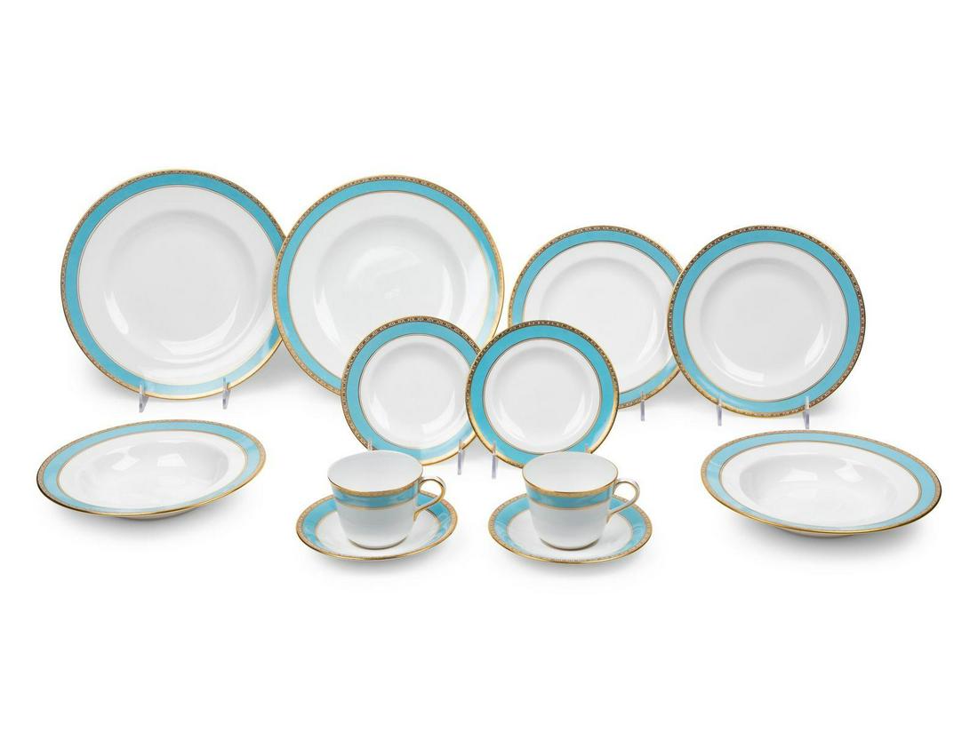 A Royal Crown Derby Gilt Decorated Porcelain Dinner: A Royal Crown Derby Gilt Decorated Porcelain Dinner Service 5th Avenue pattern, comprising 13 dinner plates, 12 bowls, 14 salad plates, 14 bread plates, 14 cups and saucers; 81 items total. Diameter o