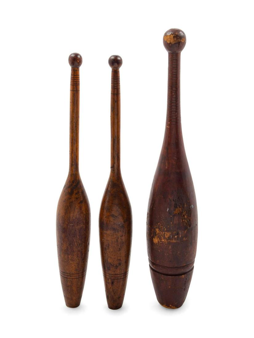 Three Juggling Pins or Indian Clubs: Three Juggling Pins or Indian Clubs 19th Century Length of longest 20 1/2 inches. Property from the Collection of Michael and Janice Doniger, Chicago, Illinois