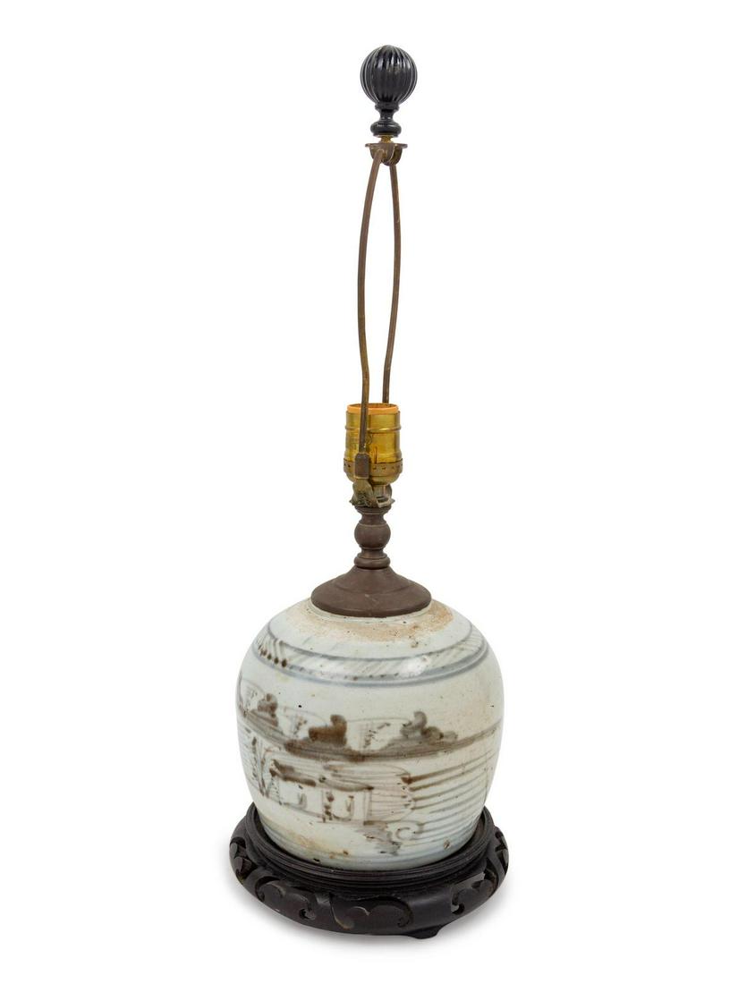 A Chinese Blue and White Glazed Canton Ginger Jar: A Chinese Blue and White Glazed Canton Ginger Jar 19th Century mounted as a lamp. Height of jar 6 inches. Property from the Collection of Michael and Janice Doniger, Chicago, Illinois