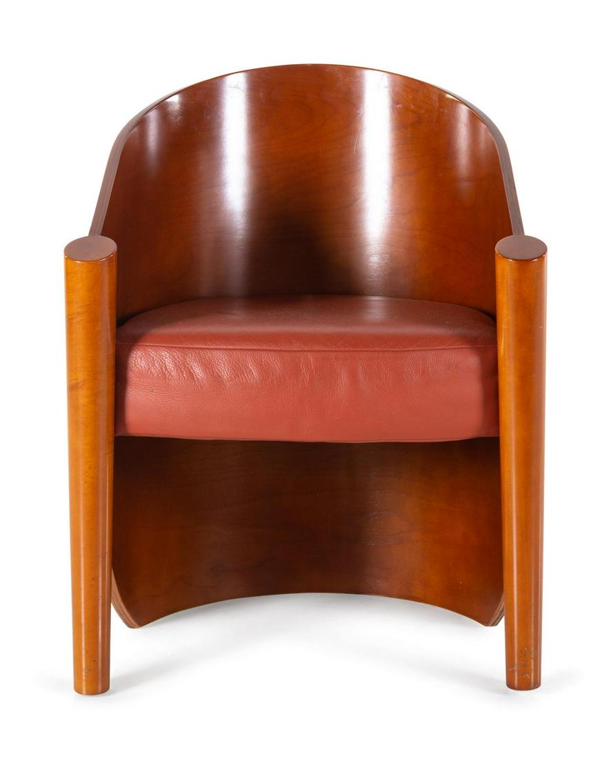 An Art Deco Style Leather-Upholstered Lounge Chair: An Art Deco Style Leather-Upholstered Lounge Chair Late 20th Century lacquered wood, leather Height 30 inches.
