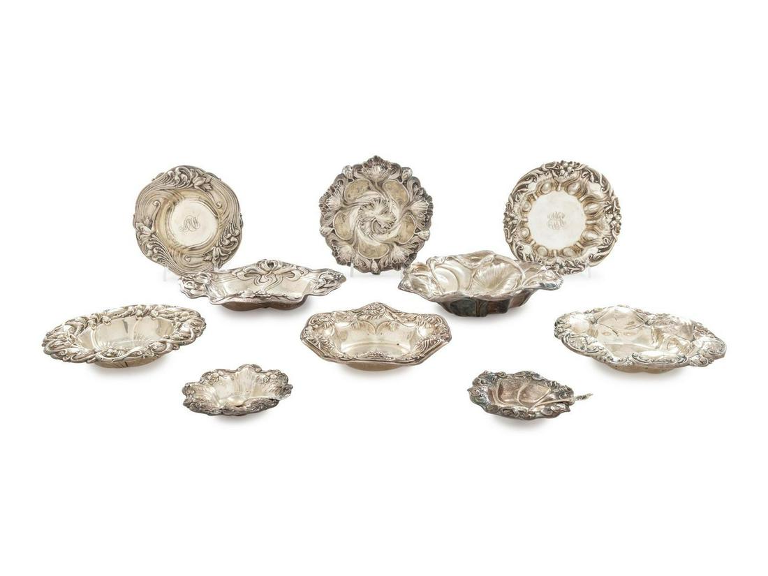 A Group of Nine American Silver Dishes: A Group of Nine American Silver Dishes Various Makers, Early 20th Century and Later each in the Art Nouveau taste, together with a Francis I salt cellar. each marked 'Sterling' on underside 26 ozt 12