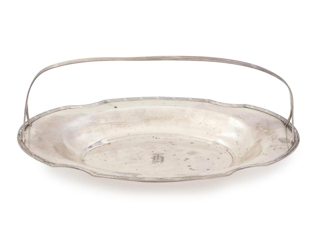 An American Silver Bread Basket: An American Silver Bread Basket 20th Century 9 ozt 18 dwts Width 11 1/2 inches. Property from the Collection of Dr. Gregory Boshart and Dr. William Lawrence, Chicago, Illinois