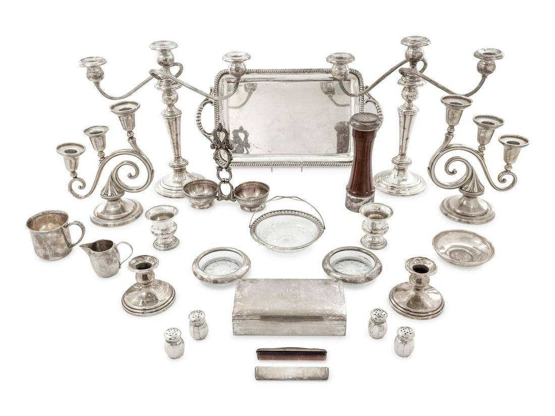 A Collection of Silver Table Articles: A Collection of Silver Table Articles Various Makers, Early 20th Century and Later comprising a Spanish twin-handled tray and twin salt cellar; a pair of American toothpick holders; a children's mug;