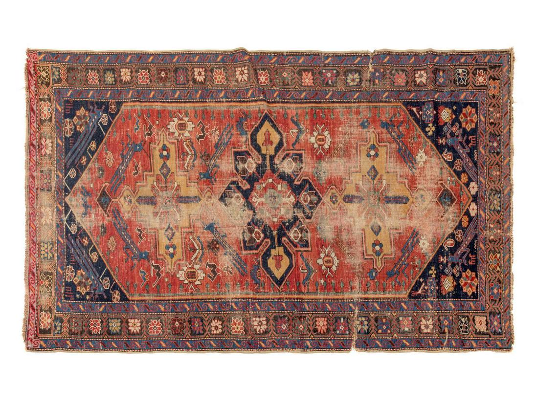 A Persian Wool Rug: A Persian Wool Rug First Half 20th Century 5 feet 11 inches x 4 feet. Property from the Collection of Michael and Janice Doniger, Chicago, Illinois