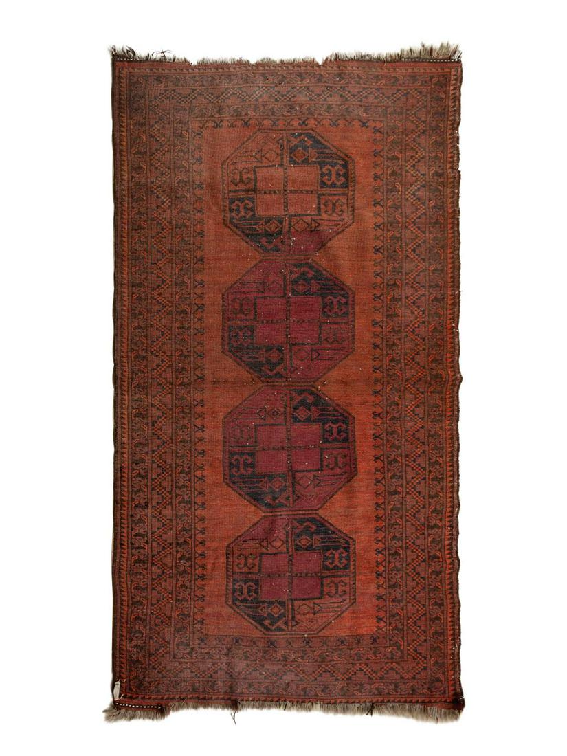 A Turkoman Wool Rug: A Turkoman Wool Rug First Half 20th Century 7 feet x 3 feet 10 inches. Property from the Collection of Dr. Gregory Boshart and Dr. William Lawrence, Chicago, Illinois