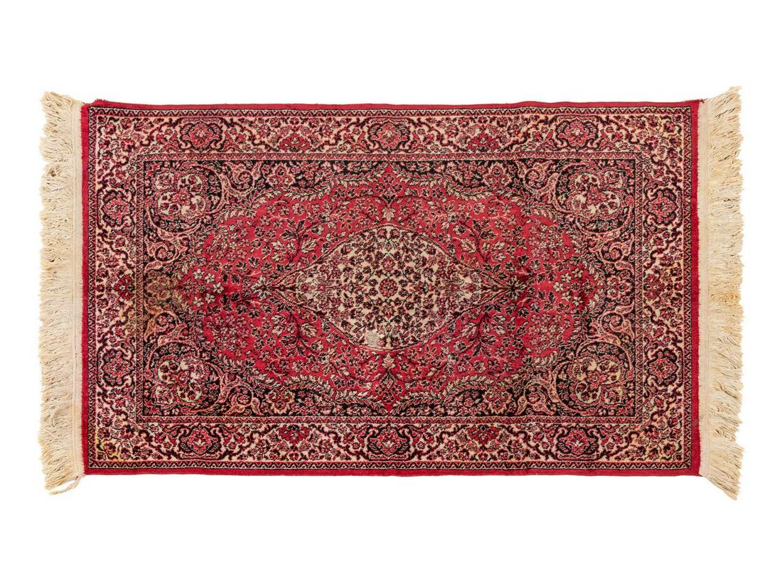 A Persian Wool Rug: A Persian Wool Rug 2 feet 2 inches x 3 feet 9 inches. Property from the Collection of Dr. Gregory Boshart and Dr. William Lawrence, Chicago, Illinois