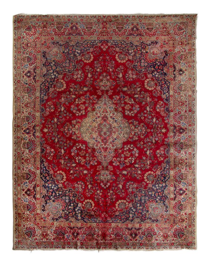 A Kashan Wool Rug: A Kashan Wool Rug 20th Century 12 feet x 9 feet. Property from the Collection of Dr. Gregory Boshart and Dr. William Lawrence, Chicago, Illinois