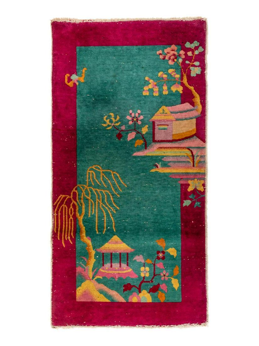 A Chinese Wool Rug: A Chinese Wool Rug First Half 20th Century 4 feet 10 inches x 2 feet 5 inches. Property from the Collection of Dr. Gregory Boshart and Dr. William Lawrence, Chicago, Illinois