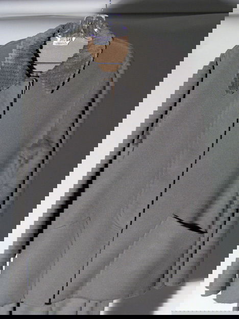 920A: BILL BLASS COUTURE WOOL & CASHMERE PANTS SUIT Wit: BILL BLASS COUTURE WOOL & CASHMERE PANTS SUIT With a boxy blazer, in grey felted wool/cashmere with corduroy collar, size 12.