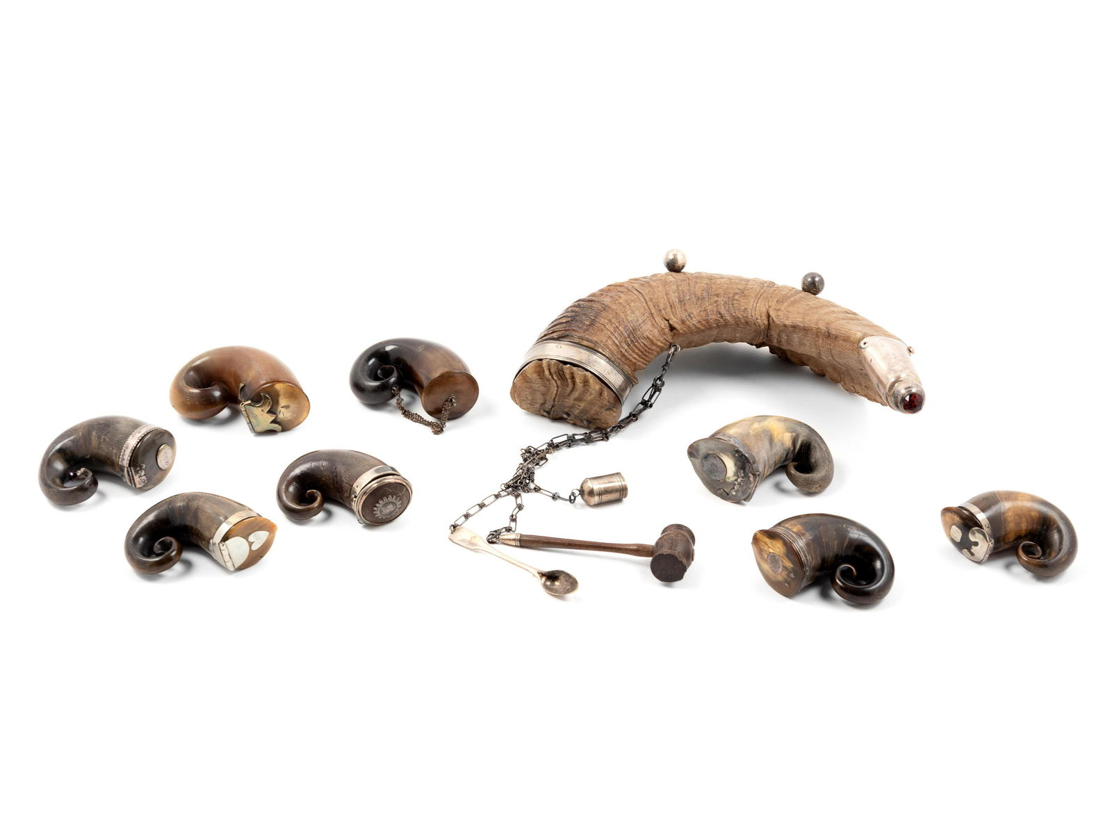 Eight Metal-Mounted Ram's Horn Snuff Mulls (1 of 3)