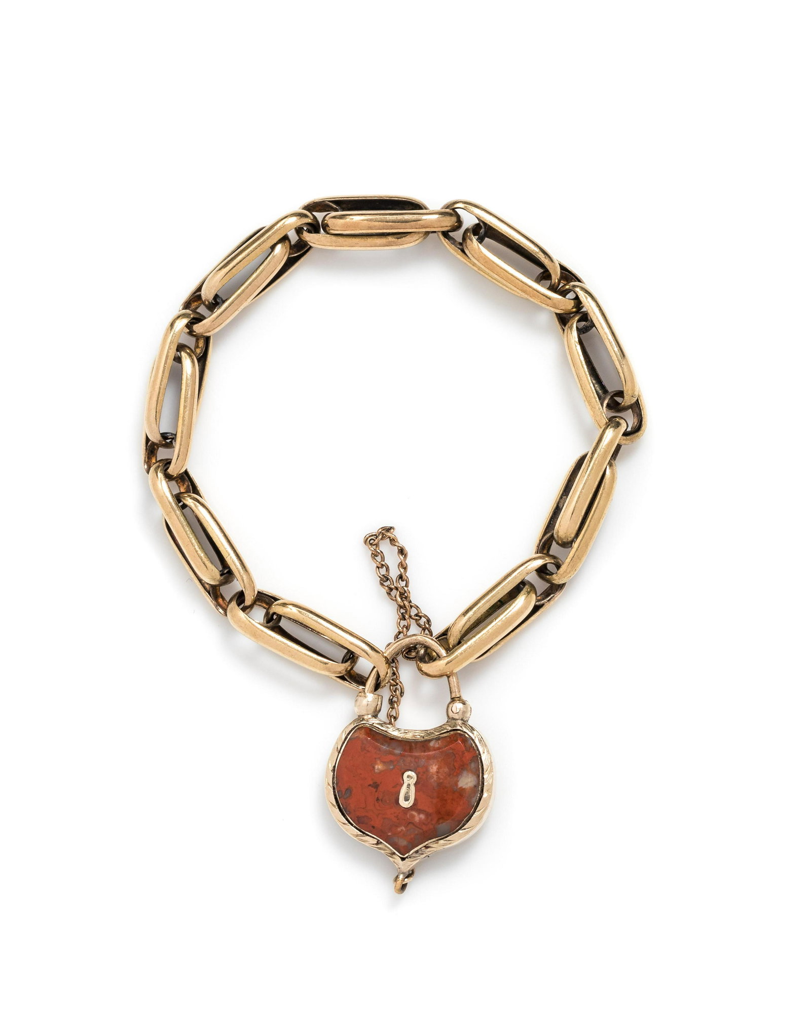 VICTORIAN, YELLOW GOLD AND AGATE BRACELET: VICTORIAN, YELLOW GOLD AND AGATE BRACELET Consisting of an oval link bracelet, the padlock clasp containing one carved agate, with safety chain. 12.00 dwts. Property from the Collection of Carol Grabs