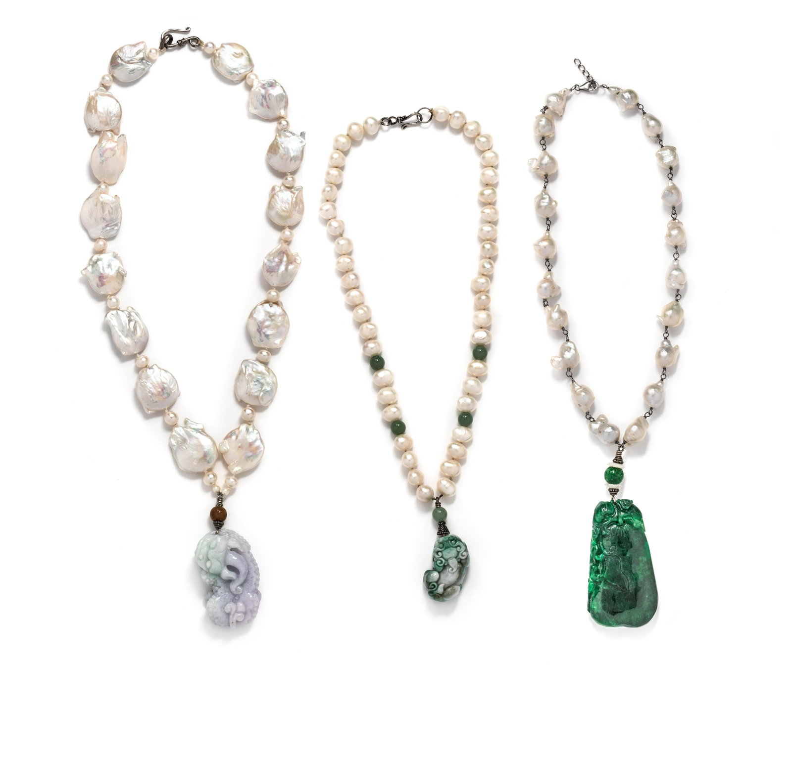 COLLECTION OF CULTURED PEARL NECKLACES: COLLECTION OF CULTURED PEARL NECKLACES Consisting of a carved jade pendant (origin of color not tested), carved jade and mother-of-pearl beads suspended from a necklace containing 20 Baroque pearls, a