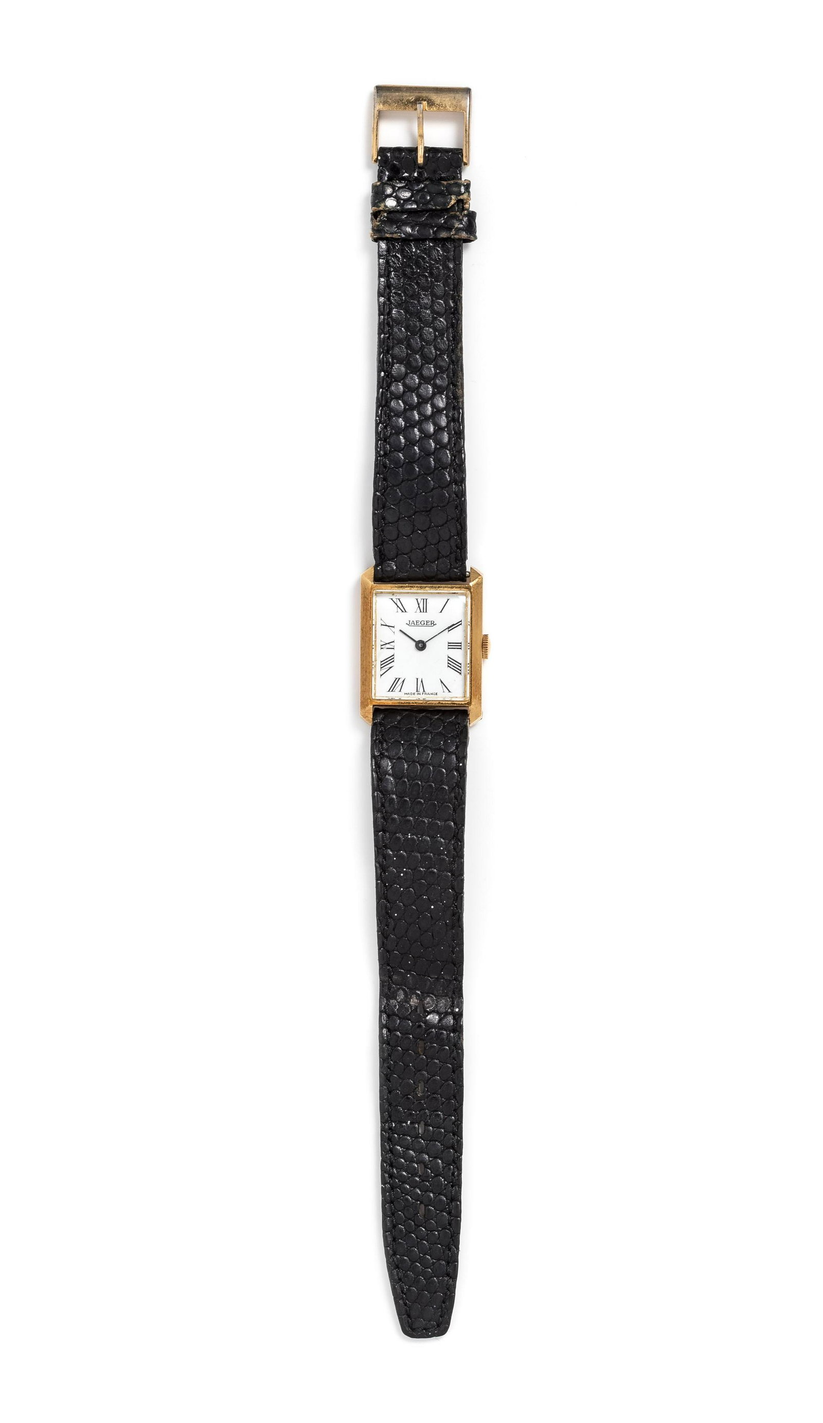 JAEGER-LECOULTRE, 18K YELLOW GOLD WRISTWATCH: JAEGER-LECOULTRE, 18K YELLOW GOLD WRISTWATCH 26.00 x 20.00 mm case dimensions inclusive of lugs, white dial signed JAEGER, black Roman numerals, black pencil hands, snap on case back, manual wind 17 j