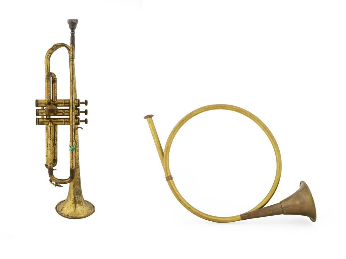 A Brass Hunting Horn and Trumpet Length of trumpet with: A Brass Hunting Horn and Trumpet 20TH CENTURY Length of trumpet with mouthpiece 20 3/4 inches.