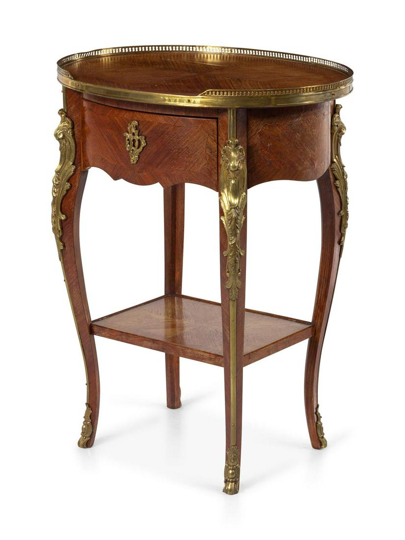A Louis XV Style Gilt Bronze Mounted Kingwood Table: A Louis XV Style Gilt Bronze Mounted Kingwood Table 20th Century Height 29 x width 23 x depth 19 inches.