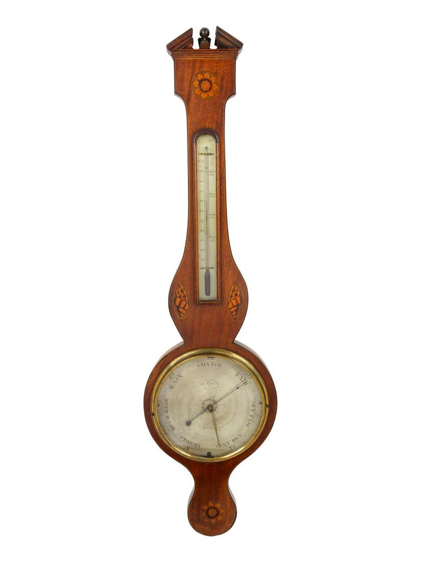 A George III Mahogany and Marquetry Wheel Barometer: A George III Mahogany and Marquetry Wheel Barometer D. Gatty, Lewes, Circa 1800 Provenance:Â Wilson Galleries, Chicago