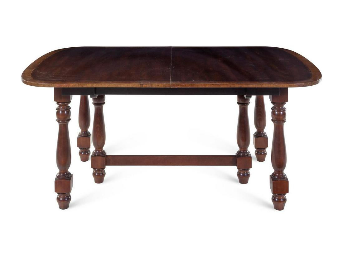 A George III Style Mahogany Dining Table: A George III Style Mahogany Dining Table 20th Century