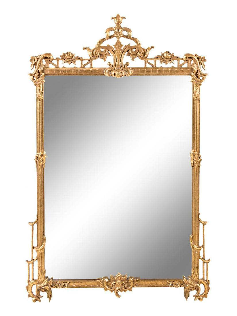 A George III Style Giltwood Mirror: A George III Style Giltwood Mirror 20TH CENTURY Height 48 x width 30 1/2 inches. Property from a Private Collection, Chicago, Illinois