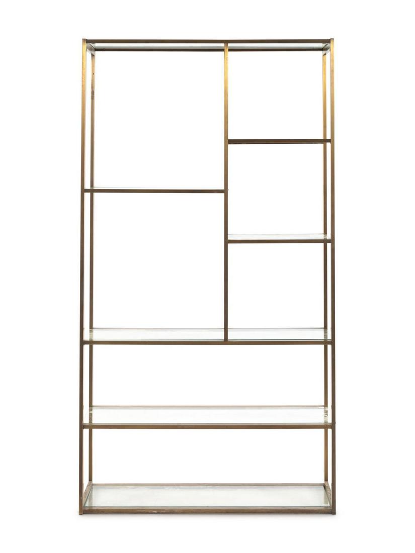 A Contemporary Gilt Metal and Glass Bookshelf: A Contemporary Gilt Metal and Glass Bookshelf Property from the Helen Simons Trust, Chicago, Illinois