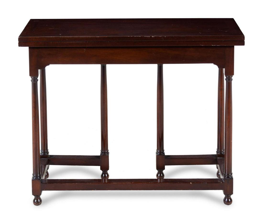 A George III Style Mahogany Gate-Leg Table: A George III Style Mahogany Gate-Leg Table 20TH CENTURY having a hinged rectangular top raised on turned legs joined by stretchers. Closed Height 28 1/2 x width 36 x depth 12 inches. Open Height 28 1/