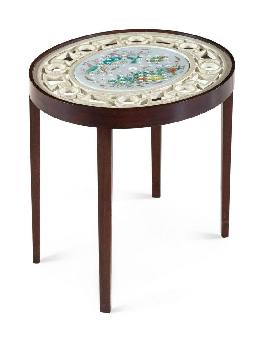 A Glass and Porcelain Inset Cocktail Table: A Glass and Porcelain Inset Cocktail Table 20th Century Height 20 x width 21 1/2 x depth 19 1/4 inches. Property from the Collection of Marion and Henry Bloch, Kansas City, Missouri