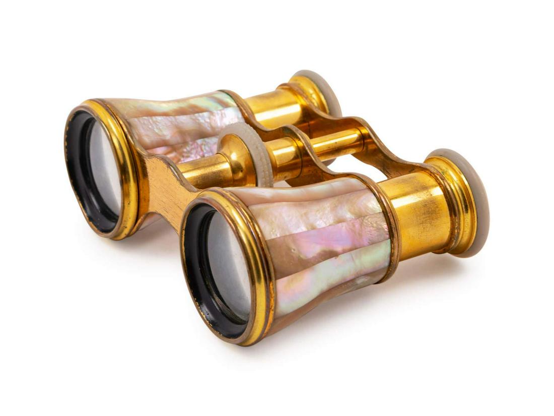 A Pair of French Abalone Veneered Opera Glasses: A Pair of French Abalone Veneered Opera Glasses Lemaire, Early 20th Century together with two magnifying glasses.Â Width 4 inches.