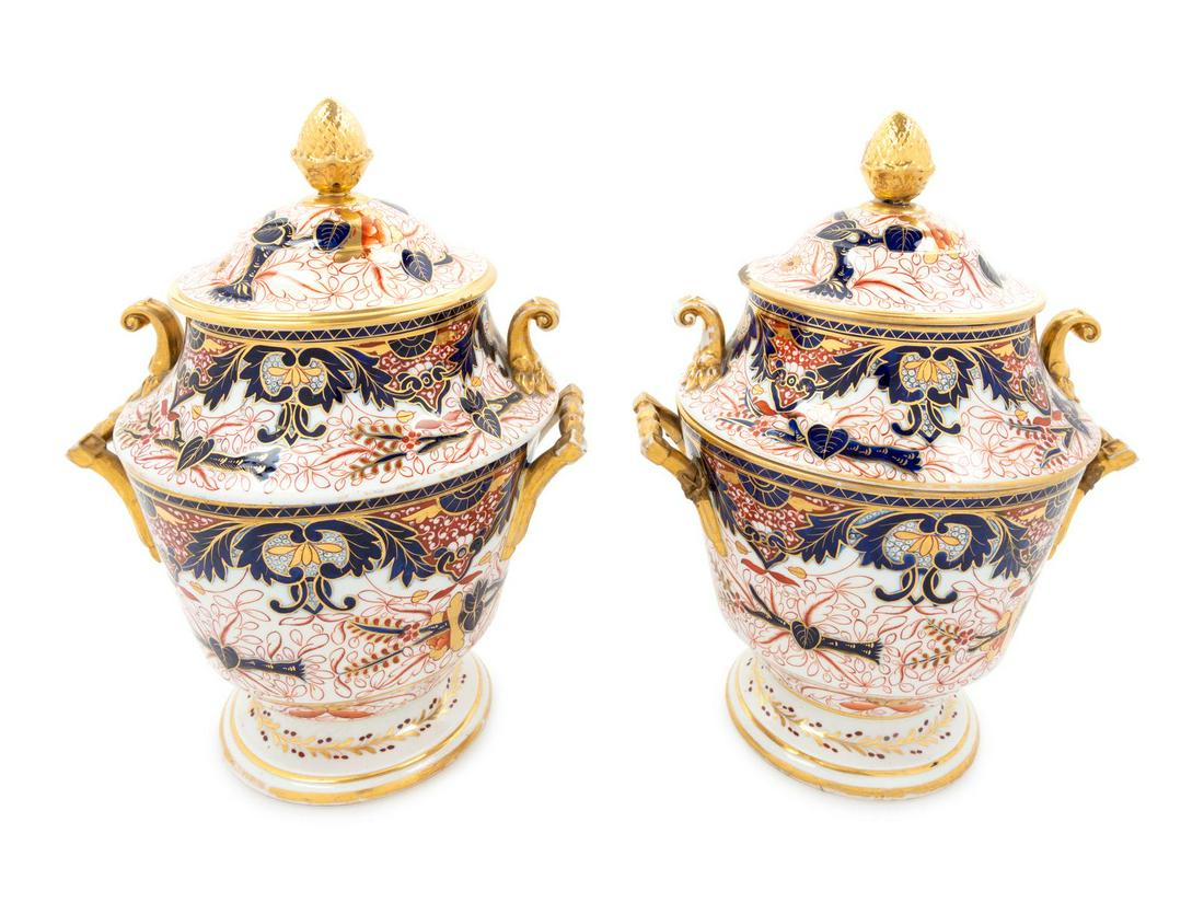 A Pair of Derby Imari-Decorated Porcelain Covered: A Pair of Derby Imari-Decorated Porcelain Covered Urns 19th Century Height 13 x width 9 1/2 inches Property from the Collection of Marion and Henry Bloch, Kansas City, Missouri Not marked Derby.