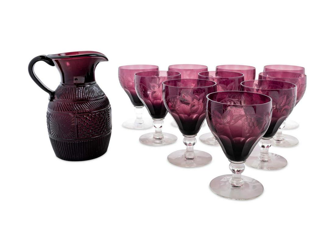 A Set of Wine Glasses and Pitcher: A Set of Wine Glasses and Pitcher Height 5 1/4 inches. Property from a Midwest Collector