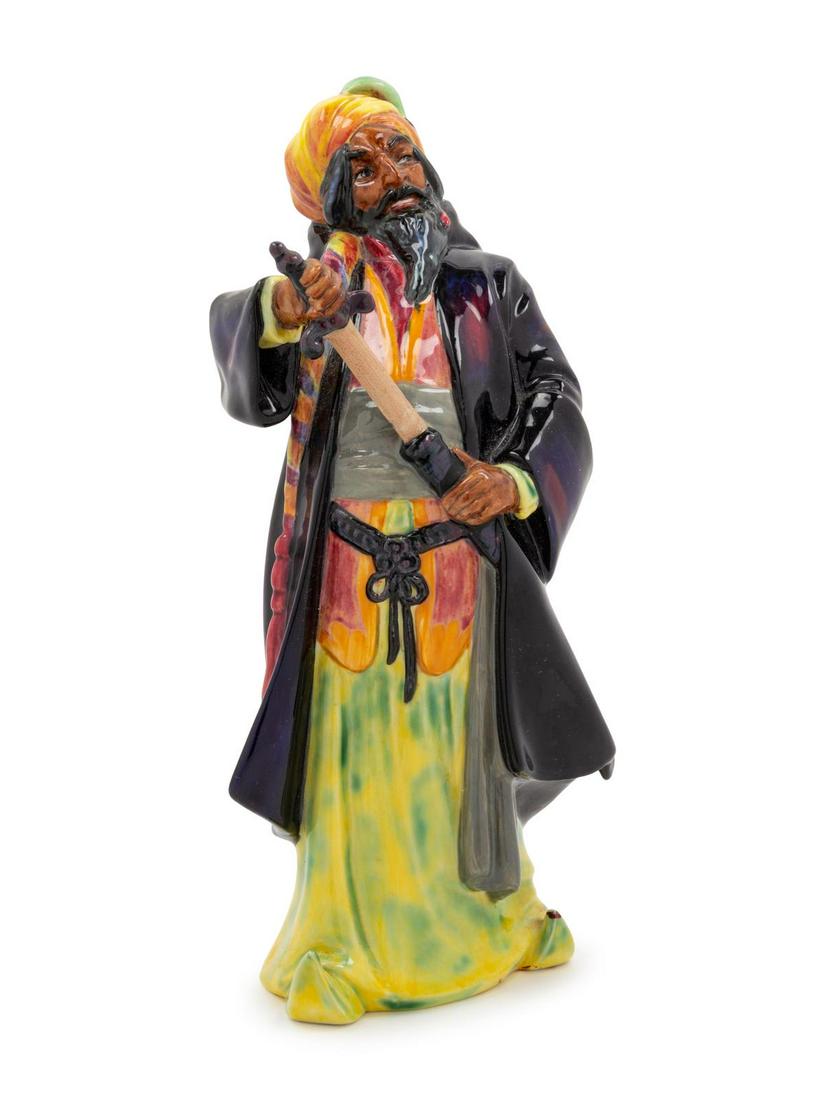 A Royal Doulton Figurine of Blue Beard and an: A Royal Doulton Figurine of Blue Beard and an Associated Ceramic FigurineÂ Height of first 10 inches.
