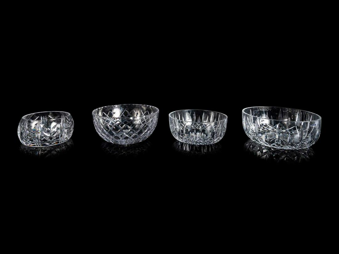 Three Waterford Glass Bowls Diameter of largest 10: Three Waterford Glass Bowls Late 20th Century together with a Cartier and a Tiffany example; 5 items total. Diameter of largest 10 inches.