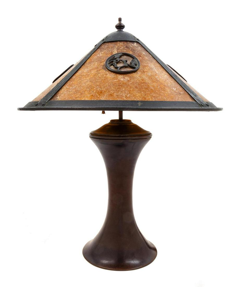 An Arts and Crafts Copper and Mica Lamp, Attributed to: An Arts and Crafts Copper and Mica Lamp, Attributed to Lillian Palmer Late 19th/Early 20th Century Height 22 x diameter of shade 18 inches.