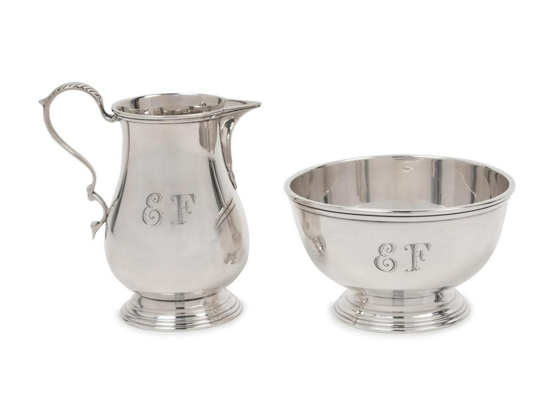 An American Silver Sugar and Creamer: An American Silver Sugar and Creamer Tuttle Silversmiths, Boston, MA, 20th Century each with an engraved monogram to the body. marked 'Sterling' on underside 7 ozt 10 dwts Height of creamer 4 inches.�