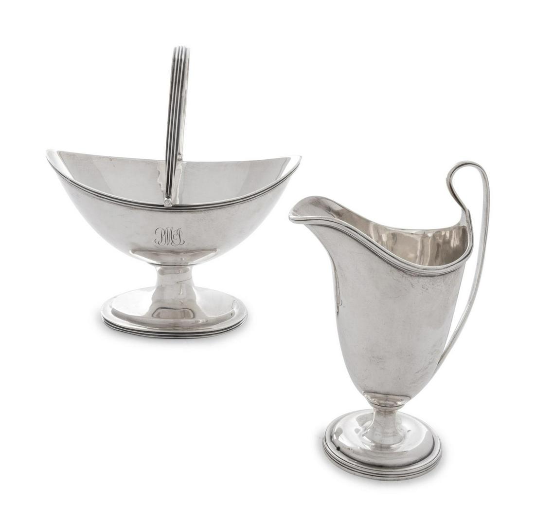 A Group of Victorian and Edwardian Silver Table: A Group of Victorian and Edwardian Silver Table Articles William Robert Smily, London, 1856 and Crichton Bros., London, 1908 comprising a crumb tray and brush, creamer and sugar. hallmarked for Sterli