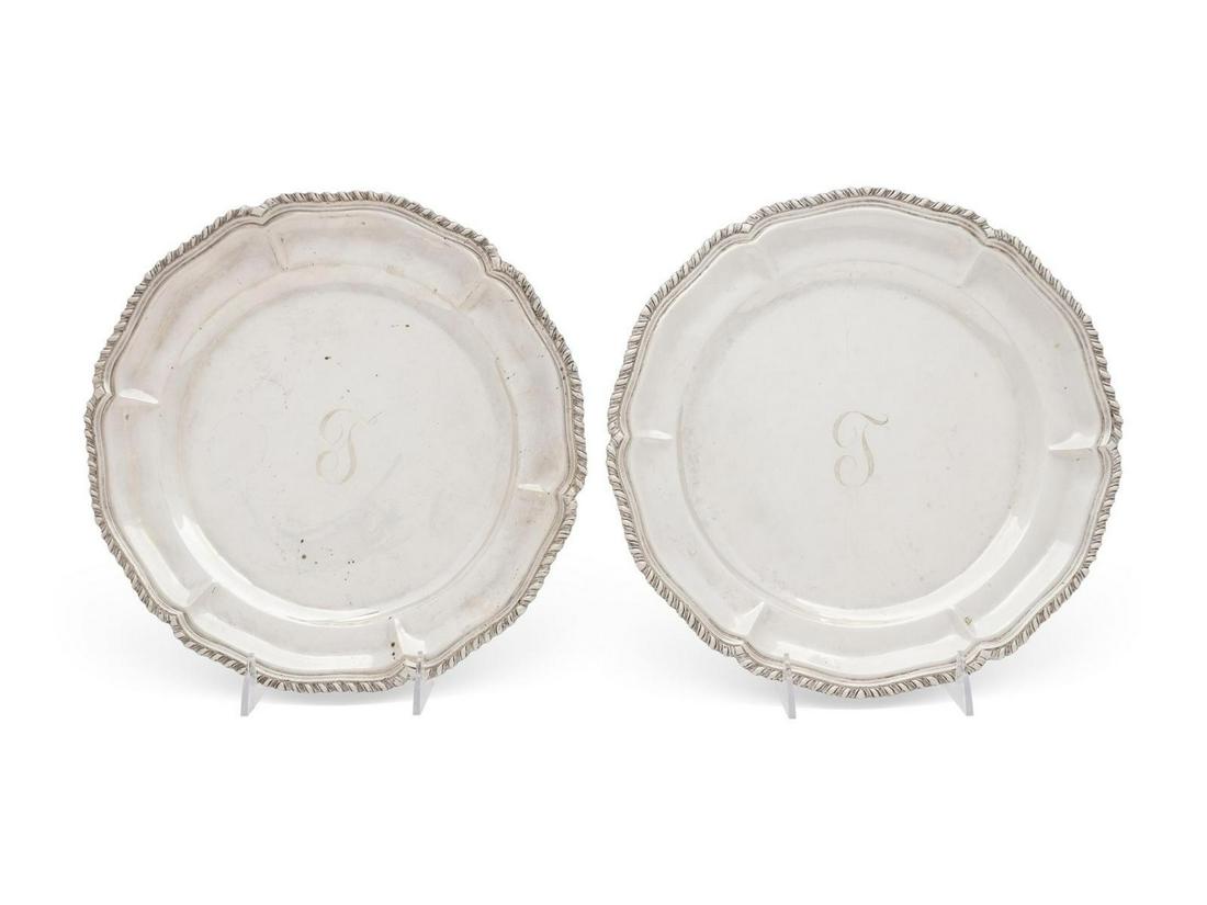 A Pair of Mexican Silver Chargers: A Pair of Mexican Silver Chargers Tane Orfebres, Mexico City, 20th Century having an undulating gadroon rim and centered by the engraved monogram 'L'. with an associated Mexican silver serving tray ma