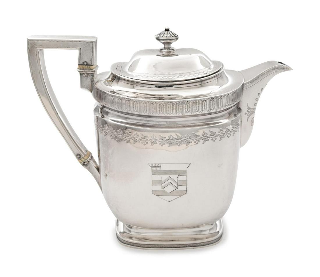A George III Silver Coffee Pot: A George III Silver Coffee Pot John Emes, London, 1807 the body with an engraved a shield crest. hallmarked for Sterling on underside 23 ozt 12 dwts Height 7 1/2 inches.Â Hobart House, Haddam, Conn