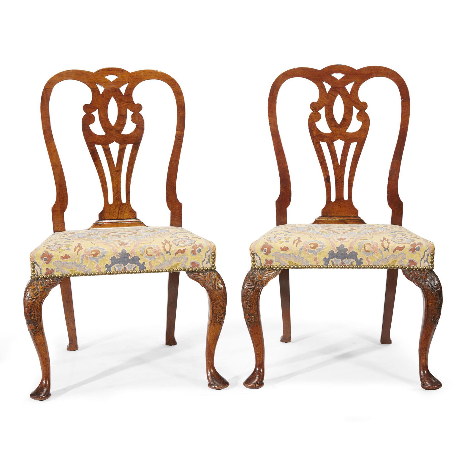 A pair of George I carved walnut side chairs, circa (1 of 1)