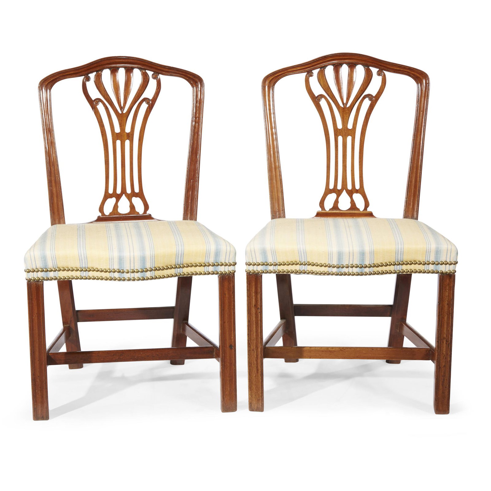 A pair of George III carved mahogany side chairs, late: A pair of George III carved mahogany side chairs late 18th century H: 37, W: 22, D: 19 in. PROVENANCE: The estate of a Virginia collector.