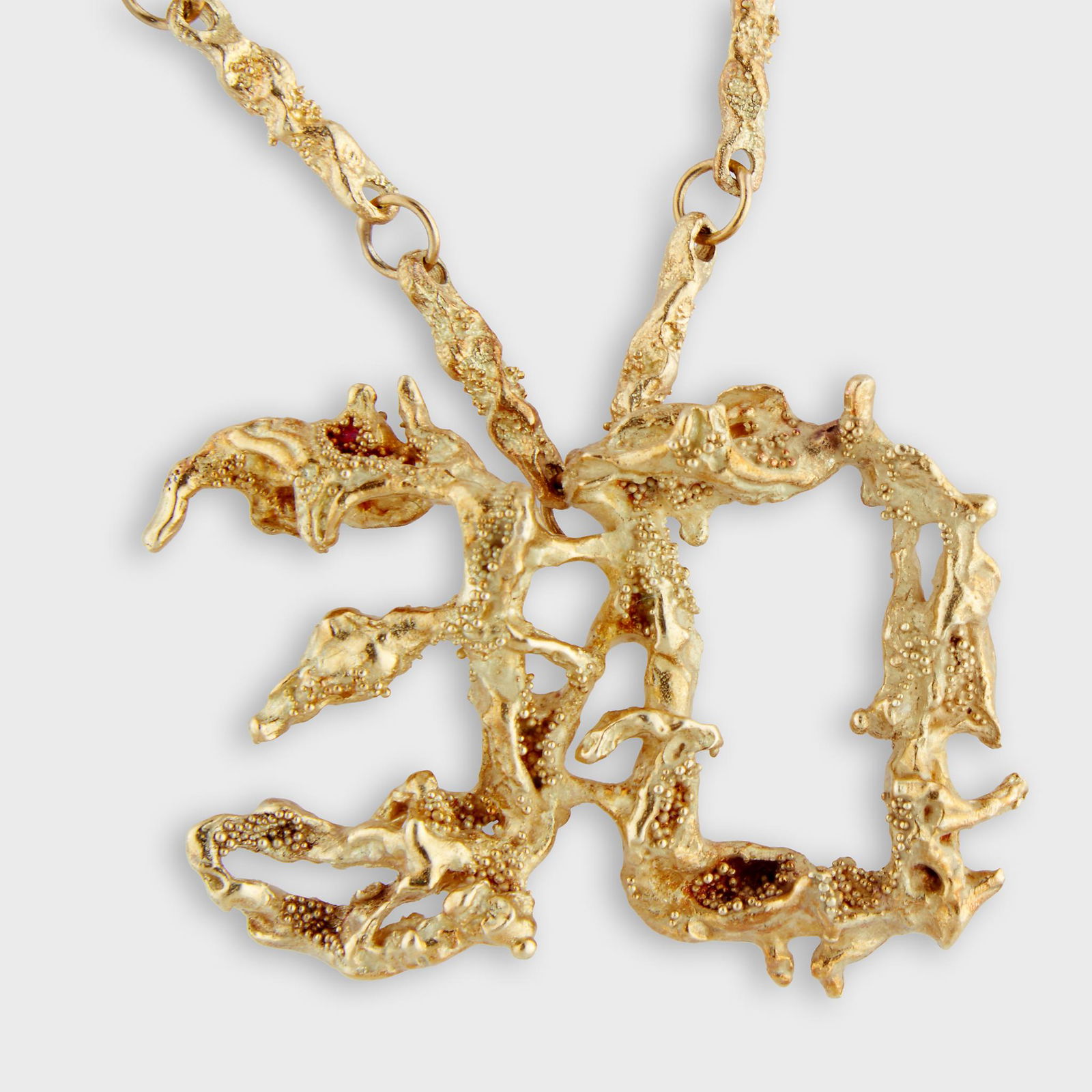 An eighteen karat gold pendant necklace, Ed Wiener,: An eighteen karat gold pendant necklace, Ed Wiener designed as a freeform link chain suspending a pendant in the same manner. 51.6 dwt.; Chain Length: 29 in.; Pendant Length: 1 in.; Pendant Width: 1 1