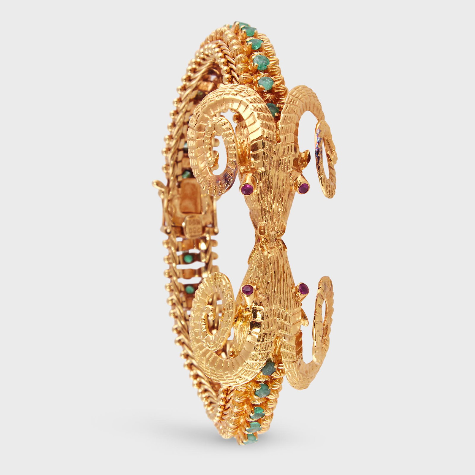 An eighteen karat gold, ruby, and emerald bracelet, (1 of 1)