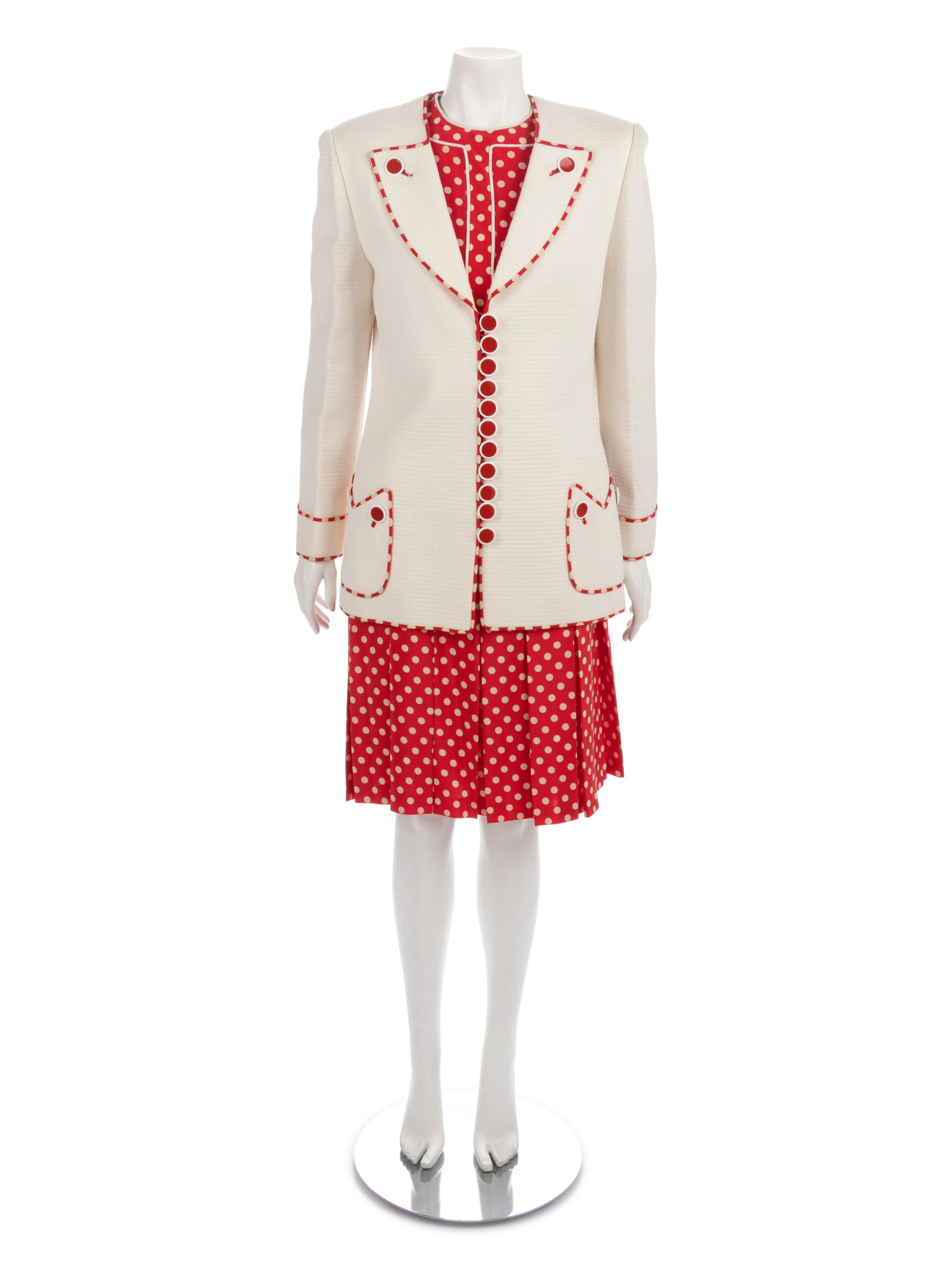 Two Suit Jacket Ensembles, 1980s: Aurora Ufolo & Oscar: Two Suit Jacket Ensembles, 1980s: Aurora Ufolo & Oscar de la Renta This lot includes two suit jacket ensembles. THE FIRST White quilted jacket with red and white polka dot trim, front hip patch po
