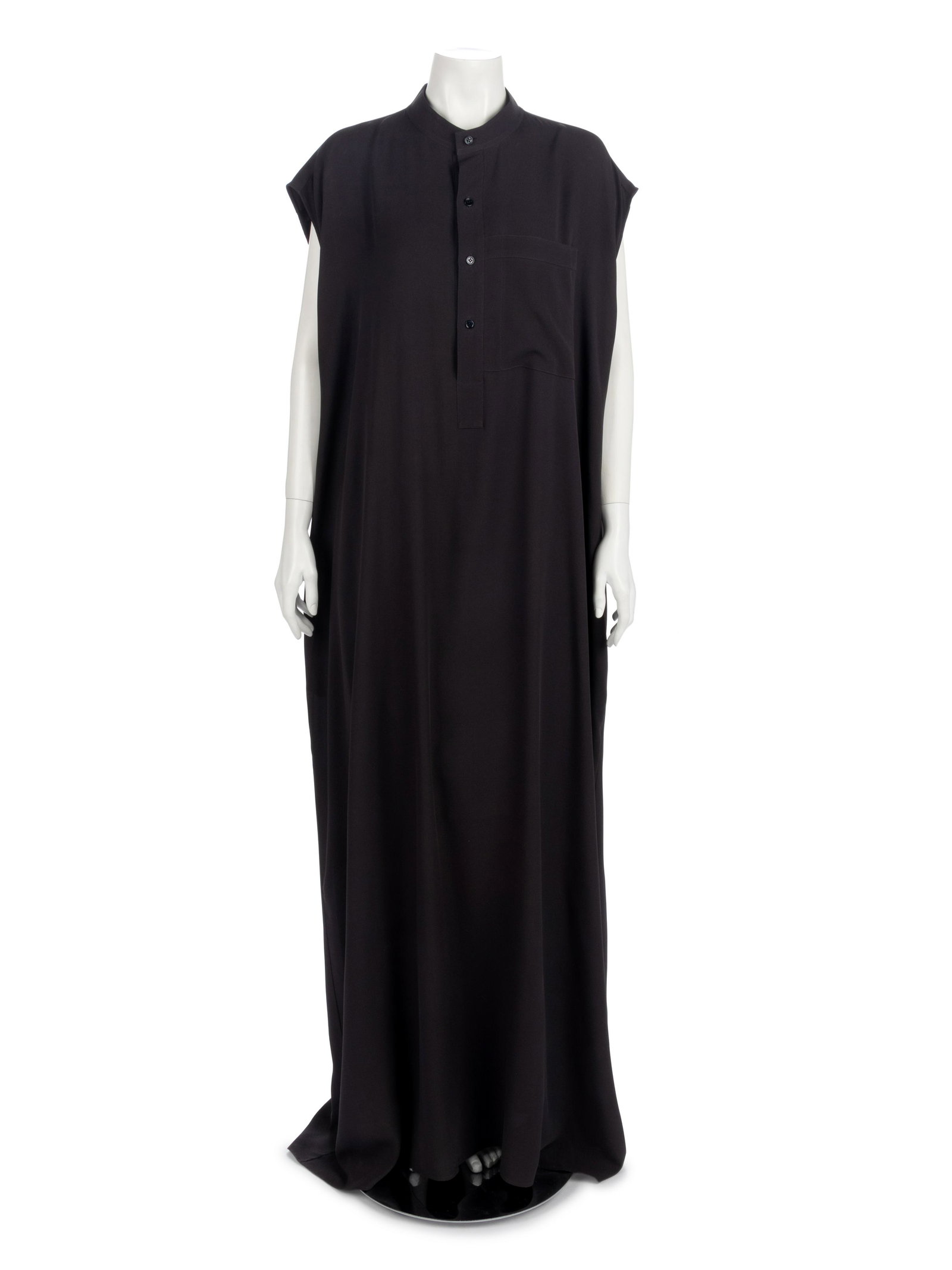 Balenciaga Black Dress, c.2010: Balenciaga Black Dress, c.2010 Black silk crepe sleeveless dress with stand collar, front neck button up closure, and unfitted skirt. Label: Balenciaga Approximate Measurements: Chest: 57.5" Waist