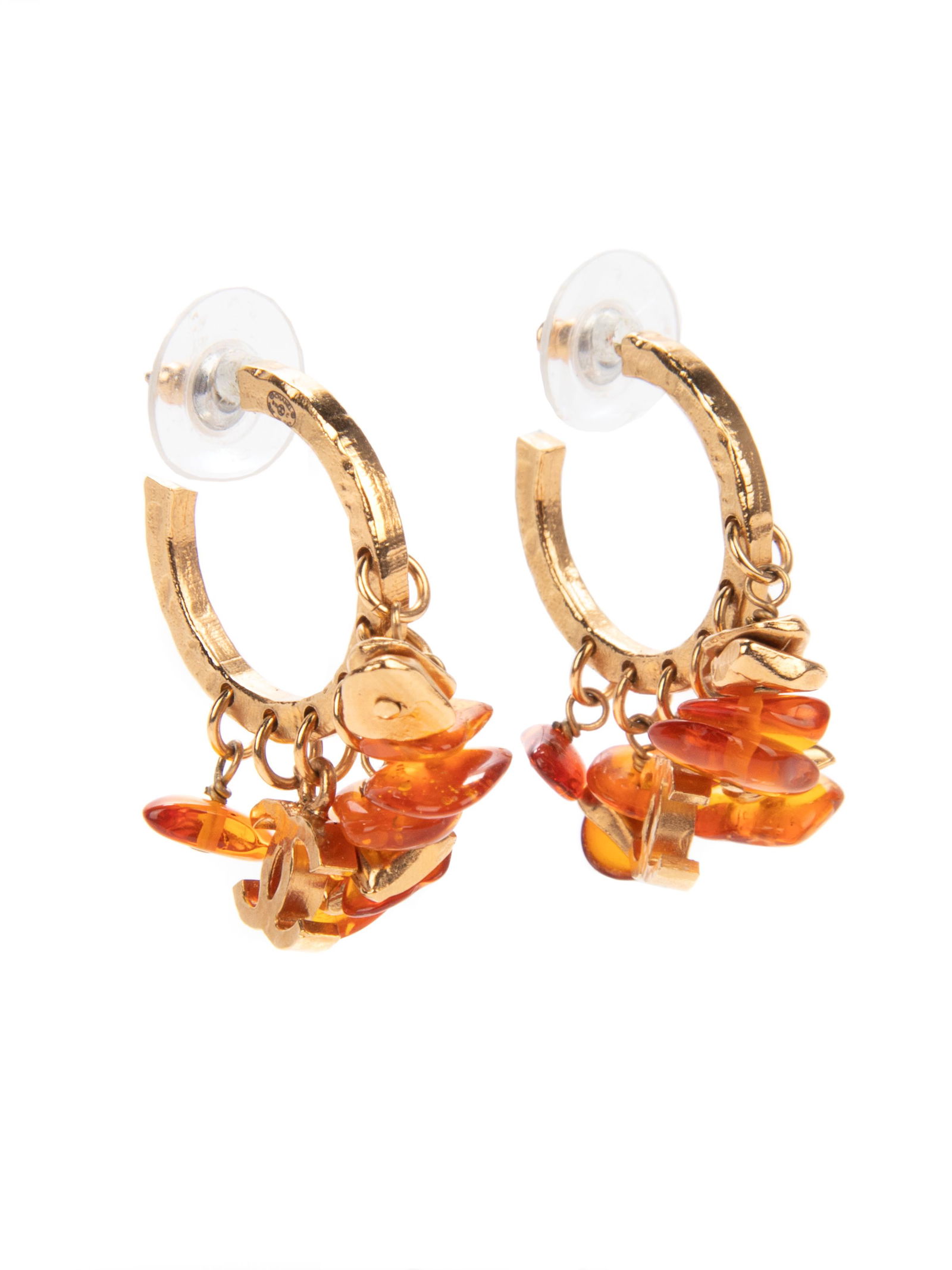 Chanel Pair of Beaded Earrings, 2011: Chanel Pair of Beaded Earrings, 2011 Gold-tone metal earrings with amber-like and gold-tone stones, and CC logo clusters. Backings are included. These earrings match a necklace and ring also available